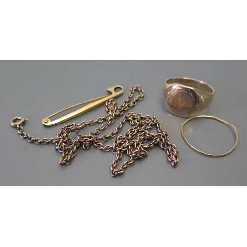 80 - A nine carat gold signet ring and necklace (10.1g), .585 gold brooch (.9g) and unmarked band