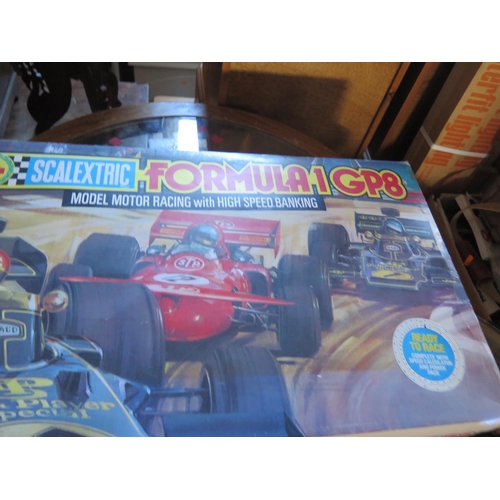 818 - A Scalextric Formula 1 GP 8 boxed set and other cars and accessories