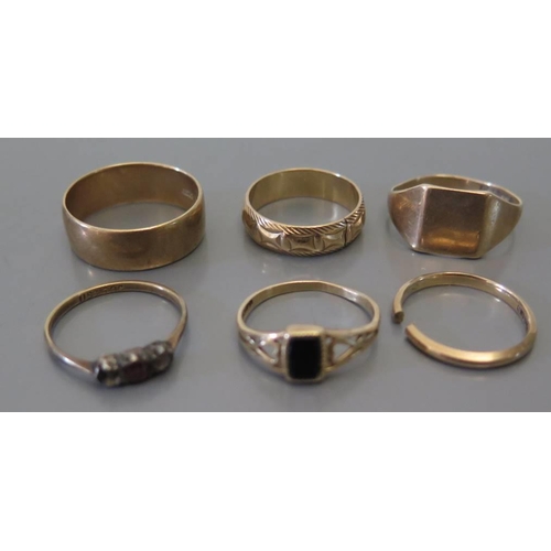 82 - Five nine carat gold rings 13.8g and one silver and gold ring