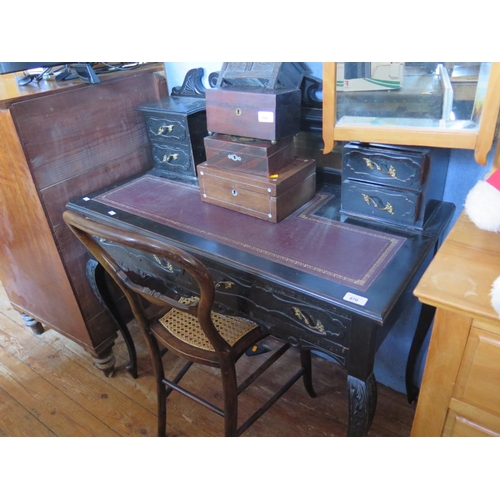 870 - A Victorian ebonised Bonheur Du Jour and cane seated chair