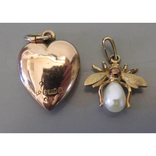 97 - A nine carat gold and Pearl insect pendant and heart shaped pendant, 2.3g