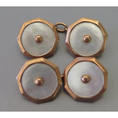 99 - A pair of 9 carat gold and mother of pearl cufflinks, 4.7 grams