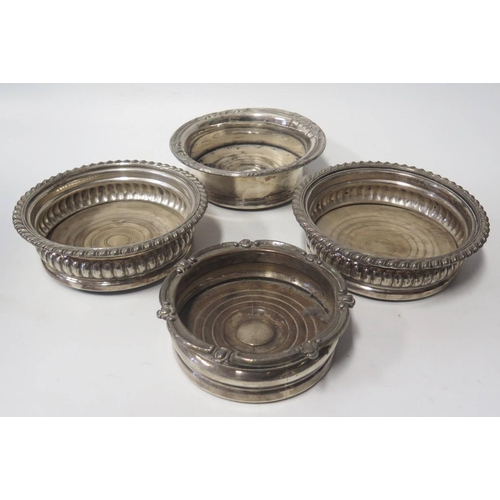 29 - A Pair of Sheffield Plated Silver Wine Coasters and two others