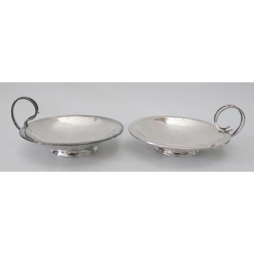 41 - A Pair of White Metal Dishes with single handle, 234g