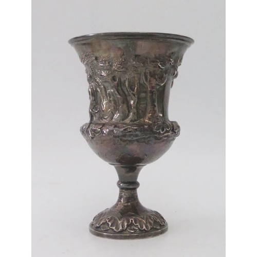 59 - A Victorian Silver Cup with embossed decoration of figure in woodland and bushels of wheat, London 1... 
