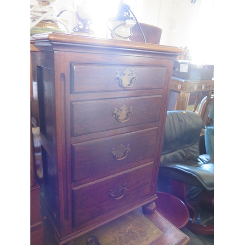 701 - A Small Oak Nest of Drawers