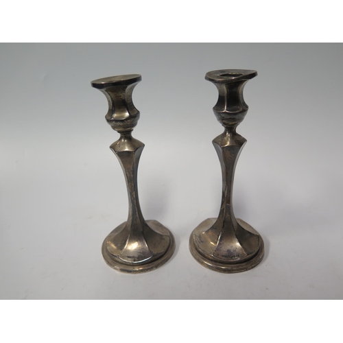 70A - A Pair of Birmingham Loaded Silver Candlesticks