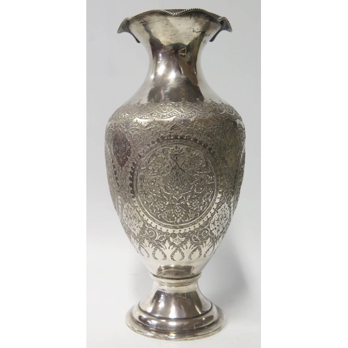 71 - A Persian Silver Vase with foliate decoration, 853g, 34cm