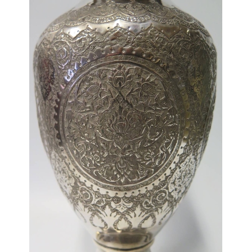 71 - A Persian Silver Vase with foliate decoration, 853g, 34cm