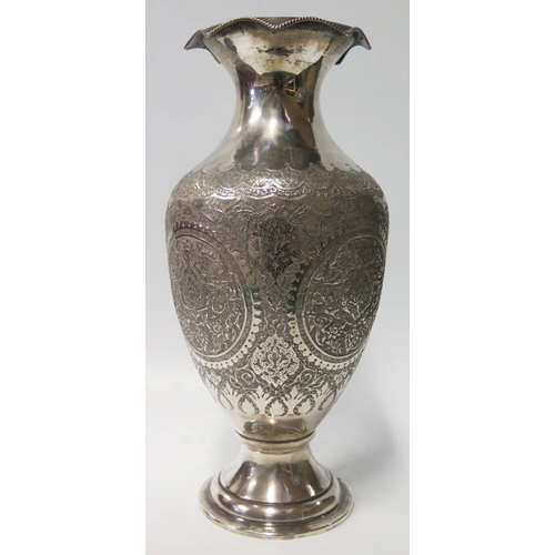 71 - A Persian Silver Vase with foliate decoration, 853g, 34cm