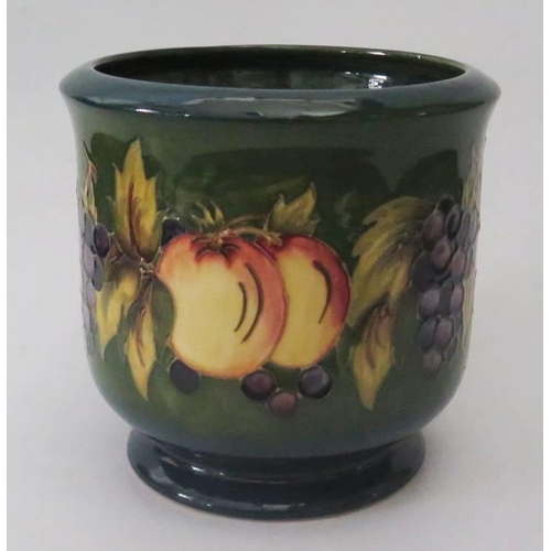 259 - A Moorcroft Green Ground Fruit Decorated Jardinière, 17.5cm high