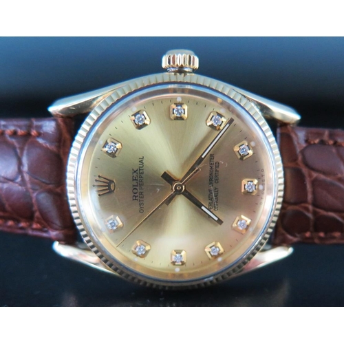 226 - A Gent's Rolex Wristwatch with 14K 33mm gold case and set with diamonds to the hours, running