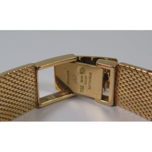 227 - A Patek Philippe Ladies 18ctGold Wristwatch with integral bracelet, 62.2g, inner and outer box, wind... 