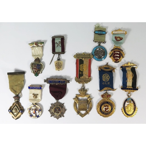 239 - A Collection of Seven R.A.O.B. and Masonic Silver and Enamel Jewels and three others