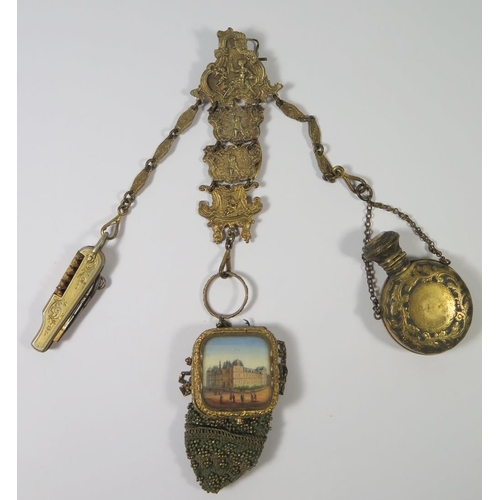 253 - A Nineteenth Century Austro Hungarian Gilt Metal Chatelaine comprising purse with hinged top reveali... 