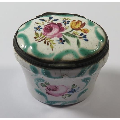 254 - An Eighteenth Century Enamel Pot decorated with flowers