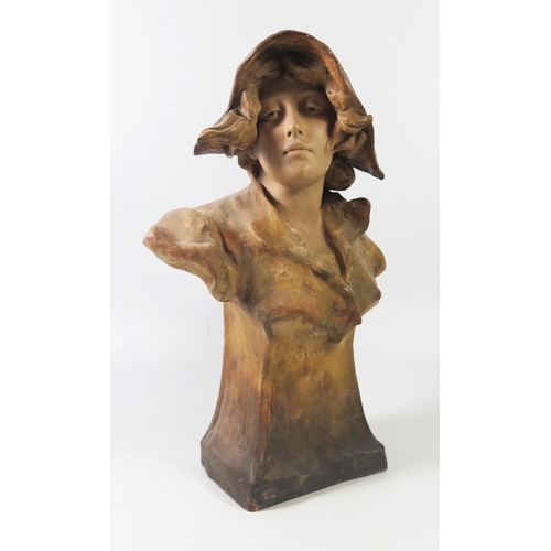 265 - A Friedrich Goldscheider Terracotta Bust of a young lady, 35cm tall