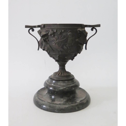 271 - A Nineteenth Century Cast Bronze Two Handled Urn on serpentine stand, 21cm tall