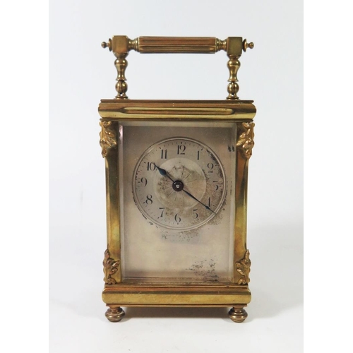 274 - A Small French Brass Carriage Clock with silvered dial retailed by Mappin & Webb, 14,5cm to top of h... 