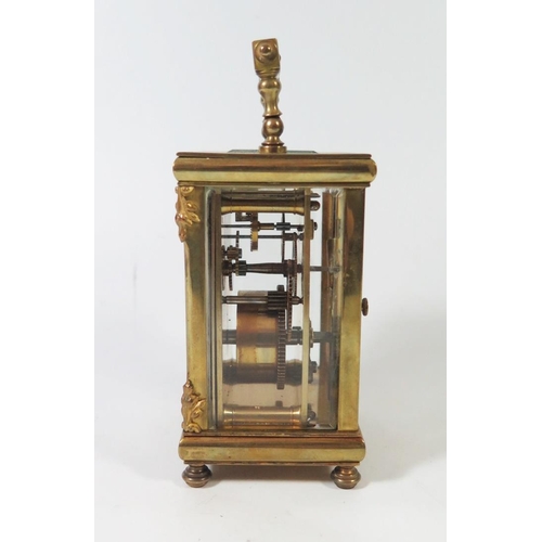 274 - A Small French Brass Carriage Clock with silvered dial retailed by Mappin & Webb, 14,5cm to top of h... 