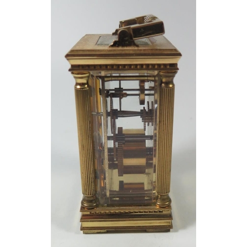 275 - A Charles Frodsham Modern Brass Carriage Clock, 14.5cm to top of handle, running and in retail box (... 