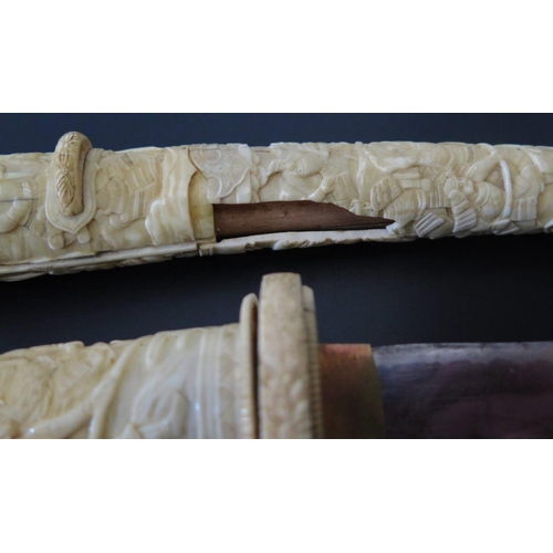 285 - A Nineteenth Century Japanese Tanto in ivory case, blade 16cm