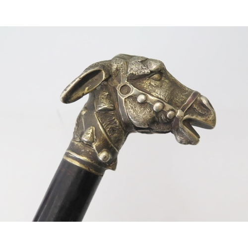 292 - A Nineteenth Century Walking Stick with cast metal handle in the form of an ass