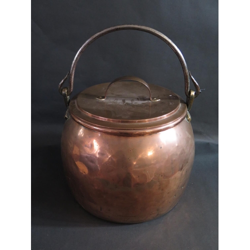43 - A Large 19th Century Pot Bellied Copper Boiler with iron swing handle and cover, 42cm diam. x 38cm h... 