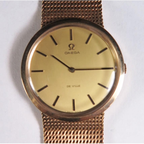 116 - An Omega Gent's 9ct Gold De Ville on integral bracelet,  58.7g gross,