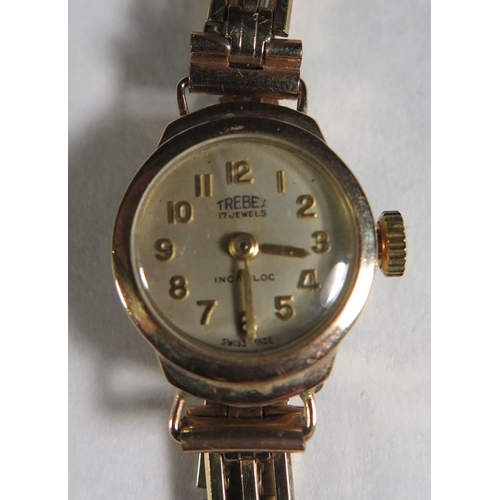 118 - A Trebex Ladies 9ct Gold Wristwatch with plated bracelet, running
**PRICE ADJUSTMENT**