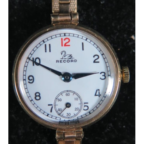 125 - A Record 9ct Gold Ladies Manual Wristwatch on a rolled gold strap, running & boxed