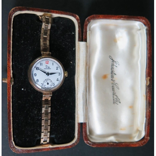 125 - A Record 9ct Gold Ladies Manual Wristwatch on a rolled gold strap, running & boxed