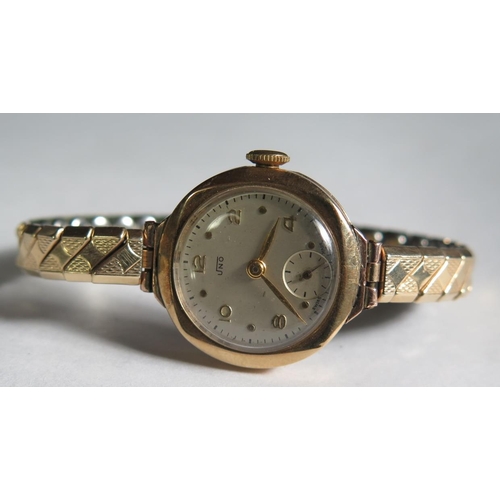 126 - An Uno 9ct Gold Ladies Wristwatch on a gold plated bracelet, running