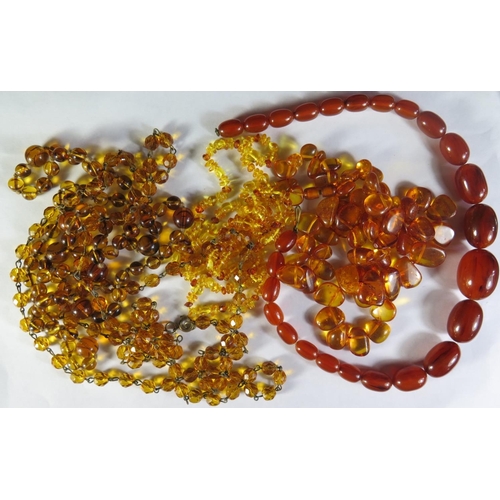 134 - A Faux Amber Bead Necklace (53.1g) other faux amber and glass bead necklaces