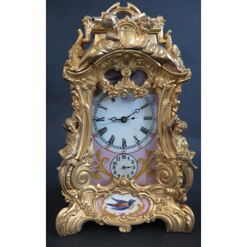 331 - An Ornate Repeating Carriage Clock with porcelain dial and panels, 23cm high, running