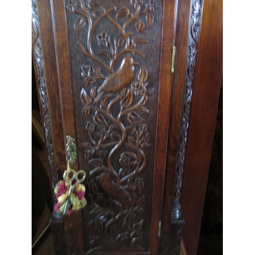 333 - A Victorian Carved Oak Longcase Clock, the eight day striking movement with painted dial, 216cm

***... 