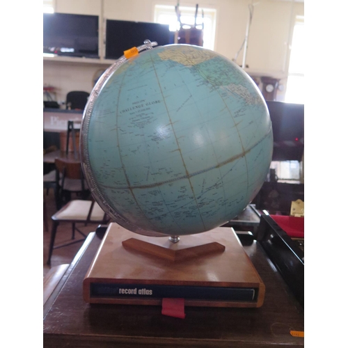 389 - A Phillip's 13.5in. Challenge Globe on Stand and with 1965 Atlas