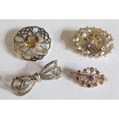 56 - An Amethyst and Pearl Brooch and three others