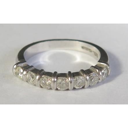 66 - A .950 Platinum and Diamond Seven Stone Ring, size J.5, 4.9g