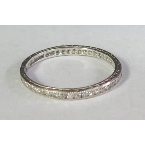 73 - A Diamond Full Eternity Ring in a precious white metal setting, size K.5, 1.5g