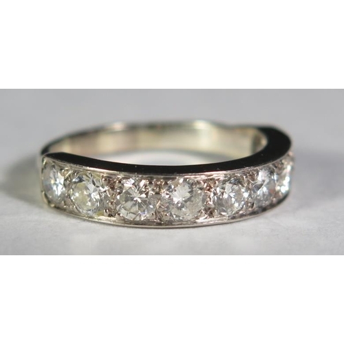 77 - A Nine Stone Diamond Half Eternity Ring in a precious white metal setting (EDW 1.5ct), size T.5, 5.6... 