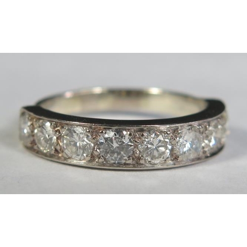 78 - A Seven Stone Diamond Half Eternity Ring in a precious white metal setting (EDW 1.2ct), size L.5, 4.... 