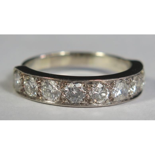 78 - A Seven Stone Diamond Half Eternity Ring in a precious white metal setting (EDW 1.2ct), size L.5, 4.... 