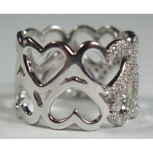 80 - An 18ct White Gold and Diamond Conjoined Hearts Ring, size S.5, 9.6g