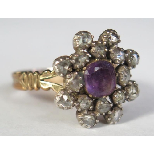 81 - A Georgian Amethyst and Rose Cut Diamond Cluster Ring in an unmarked high carat gold setting (20mm d... 