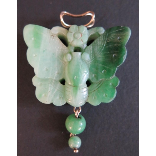 94 - A Chinese Carved Jadeite Butterfly Pendant, 53 x 36mm, 26.2g