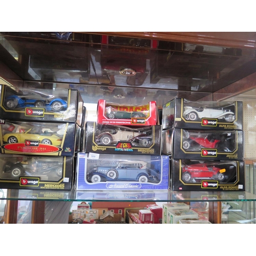 349 - A Collection of Eight Burago Boxed Die cast Cars and one Anson Classic