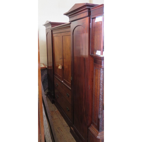 379 - An 19th Century Flame Mahogany Sentry Box Wardrobe with linen press and drawers to the centre, 2344 ... 