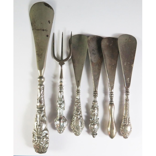 132 - A Collection of Silver Handled Shoe Horns etc.