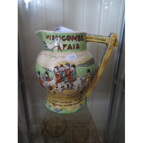 210 - A Crown Devon Fieldings Widdecombe Fair Jug, movement not working